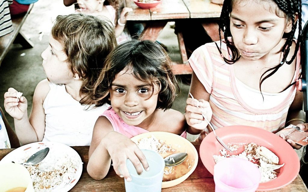 Poor children receive food