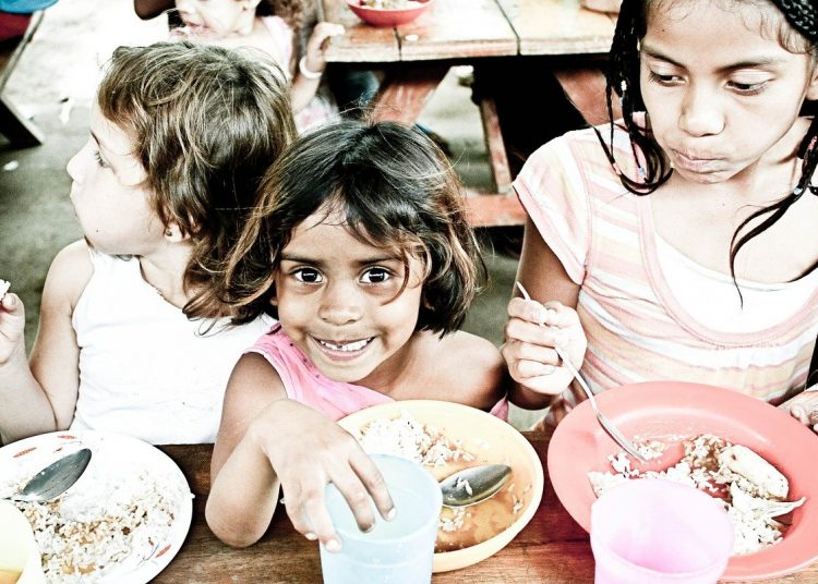 Poor children receive food