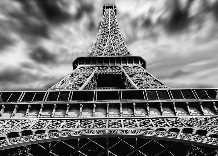 The Eiffel Tower, in black and white, seen from below