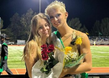 Homecoming queen. The boy on the right.