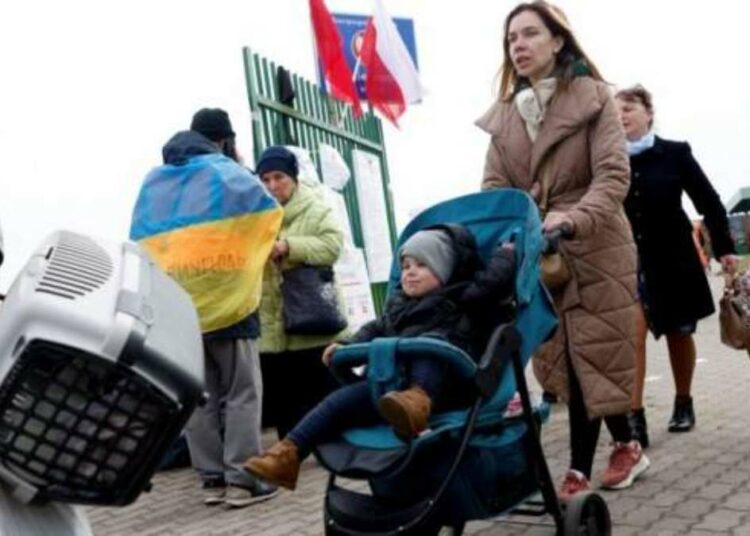 Donne ucraine e bambini in fuga dalla guerra