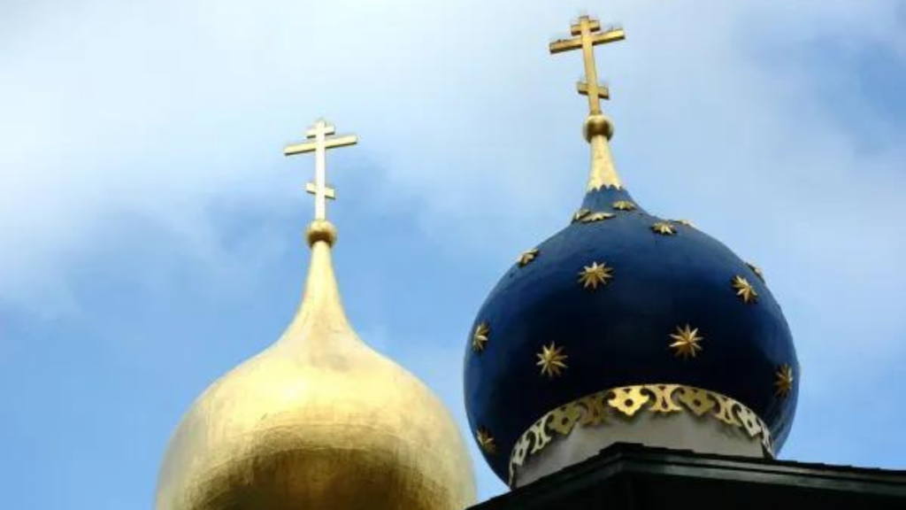 "Festive appearance of traditional Greek Russian Orthodox Spires, Orthodox Church of All Russian Saints, Burlingame, California, USA" by Wonderlane is licensed under CC BY 2.0.