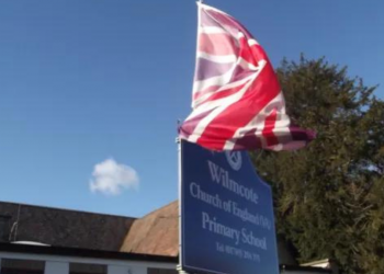 "Wilmcote Church of England Primary School - Church Road, Wilmcote - sign and flag" by ell brown is licensed under CC BY 2.0.
