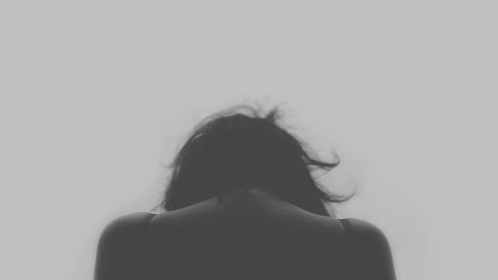 "Depressed woman" by pixabay user 'Free-photos' is marked with CC0 1.0.