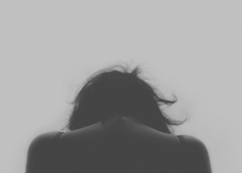 "Depressed woman" by pixabay user 'Free-photos' is marked with CC0 1.0.