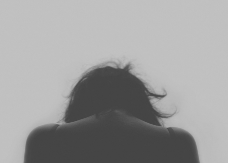 "Depressed woman" by pixabay user 'Free-photos' is marked with CC0 1.0.