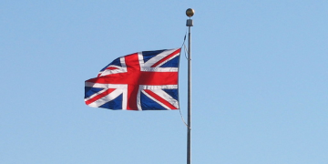 "The British Flag" by Chris Breeze is licensed under CC BY 2.0.