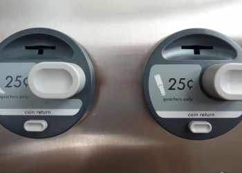 "Menstrual hygiene product dispenser" by Beth Van Dam from Los Angeles, United States is licensed under CC BY-SA 2.0.