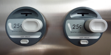 "Menstrual hygiene product dispenser" by Beth Van Dam from Los Angeles, United States is licensed under CC BY-SA 2.0.