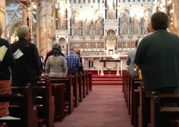 Catholic priest faces possible arrest for defending Holy Communion from desecration by lesbian parishioner